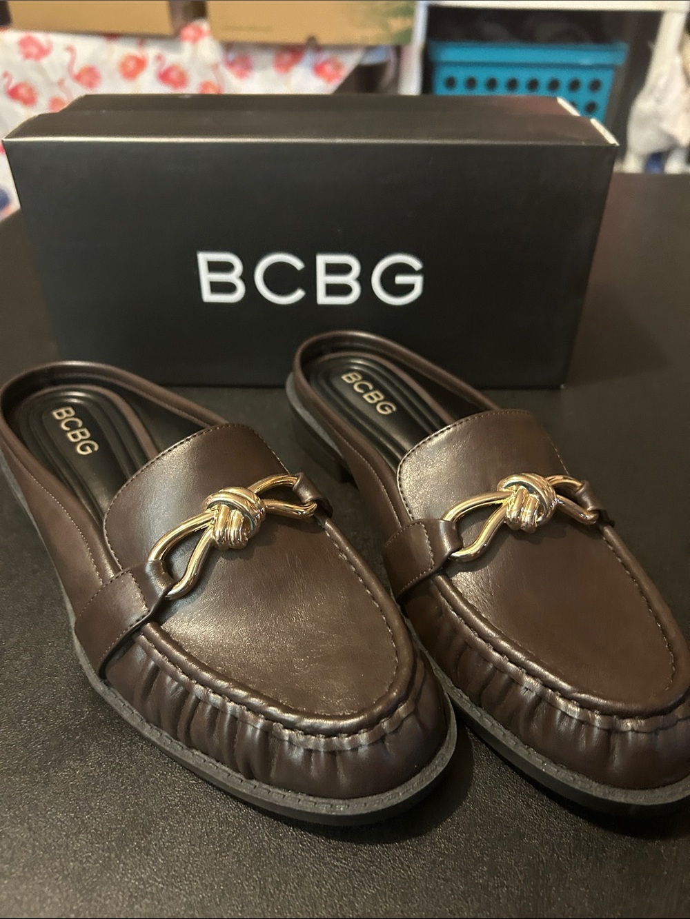 BCBG Brown Leather Slip-On Loafers with Gold Knot Accent